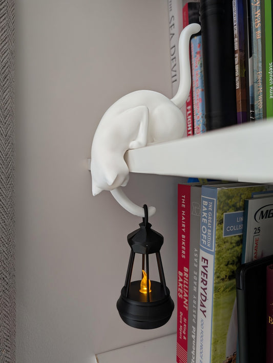 Black cat shelf ornament holding hanging flickering lantern For Cat Lovers & Bookworms