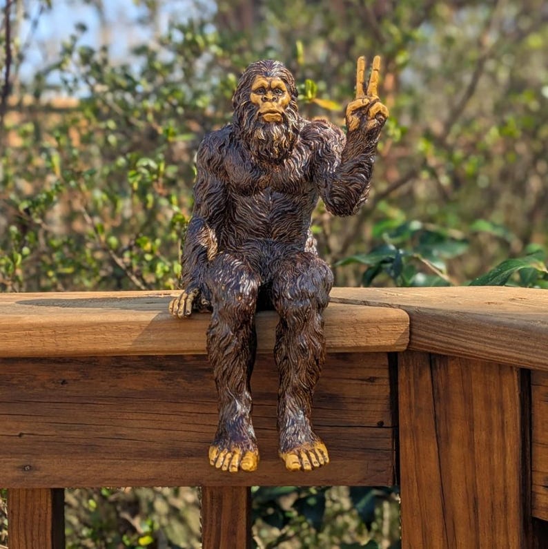 Bigfoot Peace Sign Sasquatch Yeti Statue Indoor/Outdoor for Patio, Deck, Home, Office 10 in H Shelf Sitter Figurine